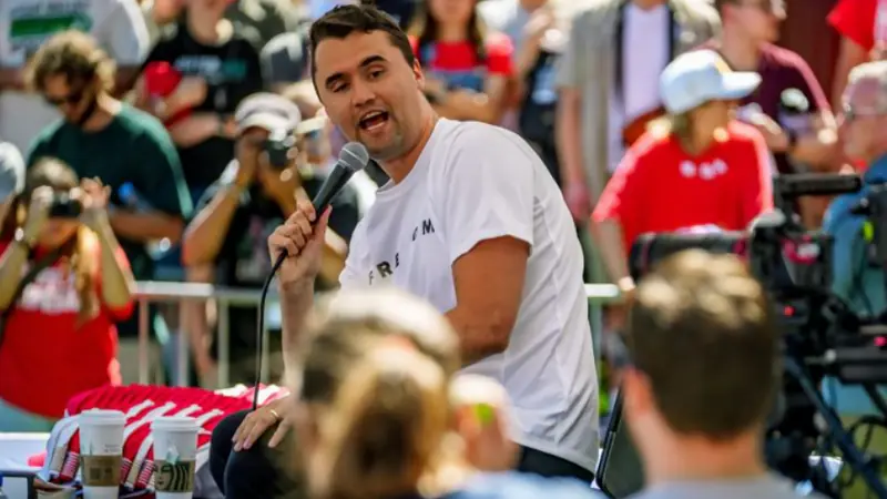 BuzzLine News: Hand Signals or Coincidence? Online Speculation Mounts Over Charlie Kirk Assassination